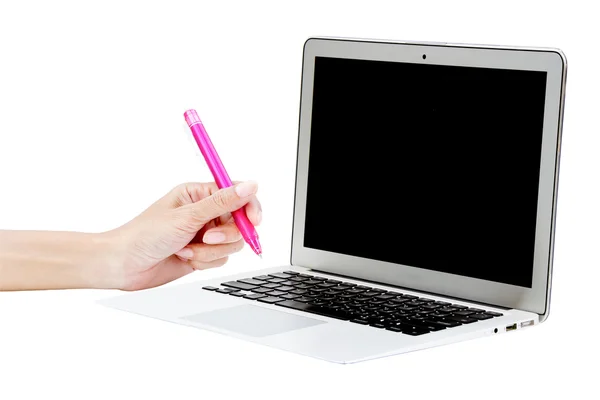 Laptop med hand och penna — Stockfoto