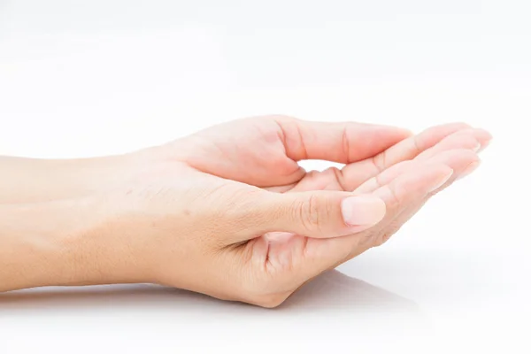 Woman hands with open palms over white table — Stock Photo, Image