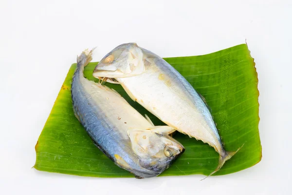 Mackerel steamed on banana leaf on a white background. — Stock Photo, Image