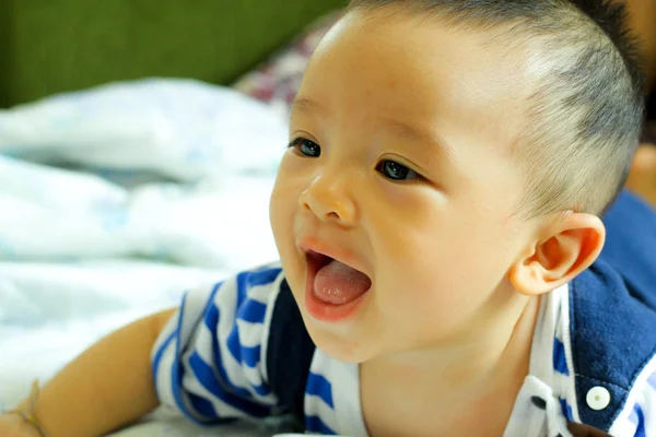 Portrait of adorable curious smile baby boy close up — Stock Photo, Image