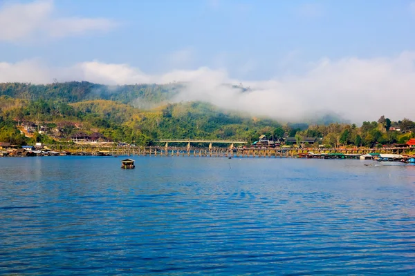 Foggy morning at bridge Sangkhlaburi. — Stock Photo, Image