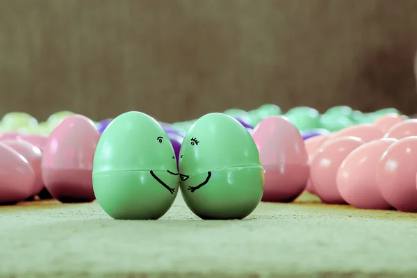 Couple in love with paint made from plastic egg — Stock Photo, Image