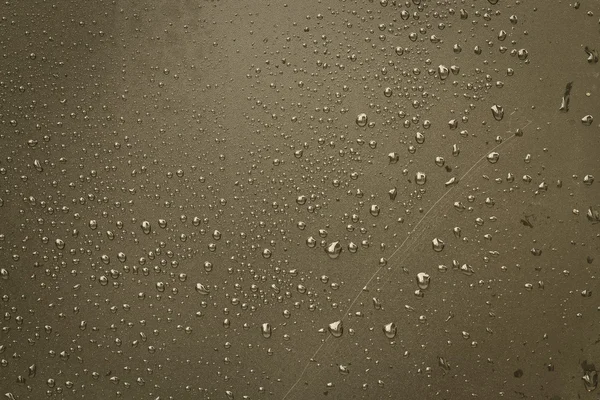 Gotas de agua en una lámina de plástico — Foto de Stock