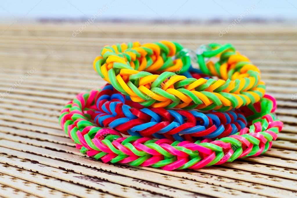 Colorful Rainbow loom bracelet rubber bands fashion close up Stock