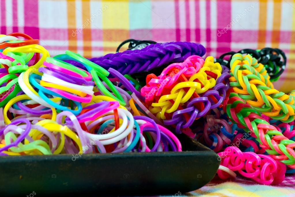 Colorful Rainbow loom bracelet rubber bands fashion Stock Photo by