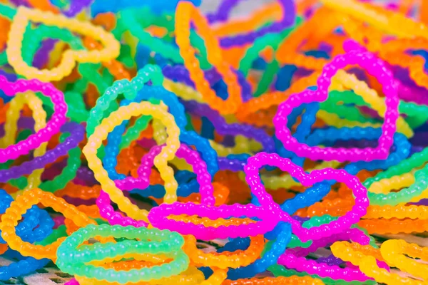Close up of color full elastic love heart shape loom bands rainb — Stock Photo, Image