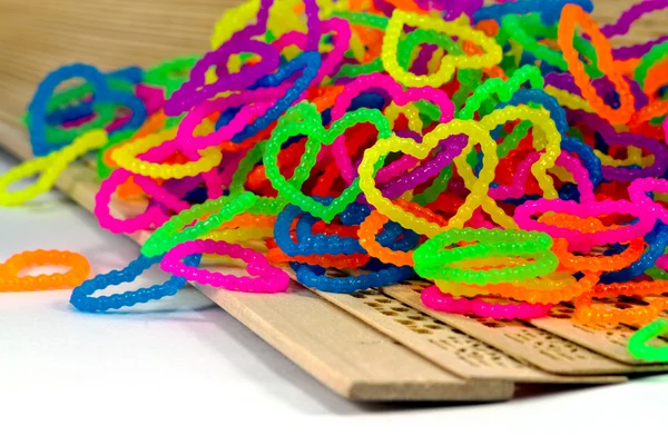 Close up of color full elastic love heart shape loom bands rainb — Stock Photo, Image