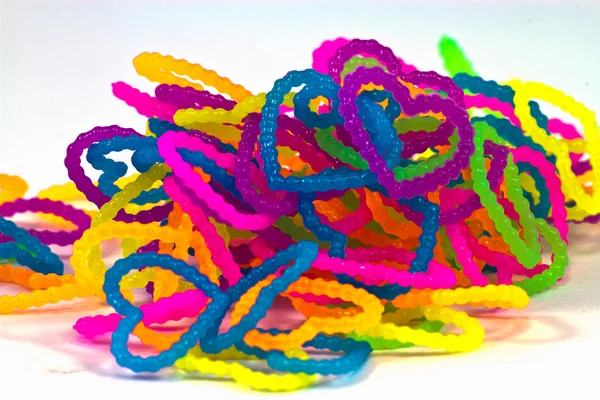 Close up of color full elastic love heart shape loom bands rainb — Stock Photo, Image