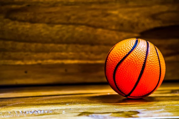 De ballen op een houten vloer met lichteffect — Stockfoto