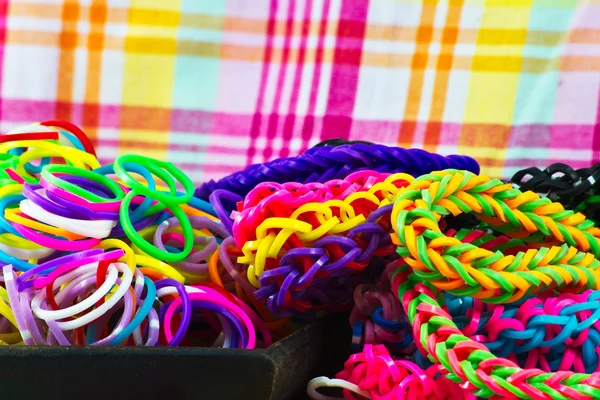 Colorful Rainbow loom bracelet rubber bands fashion close up Stock
