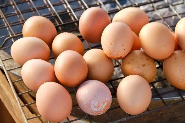 Egg Grill on stainless mesh with focus on Foreground Thai Food i — Stock Photo, Image