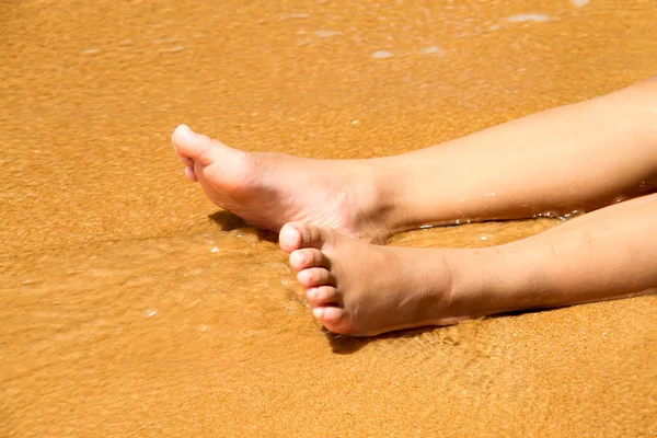 Pierna en la playa — Foto de Stock