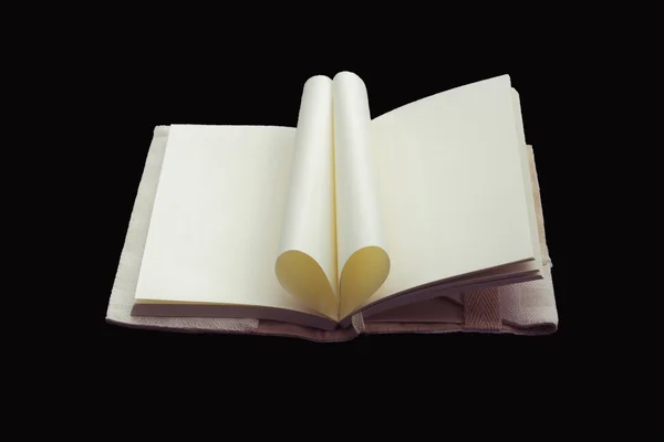 Coração em forma de livro isolado no fundo preto . — Fotografia de Stock