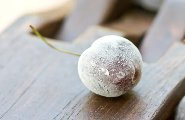 Frozen cherry berries  on the wooden table — Stock Photo, Image