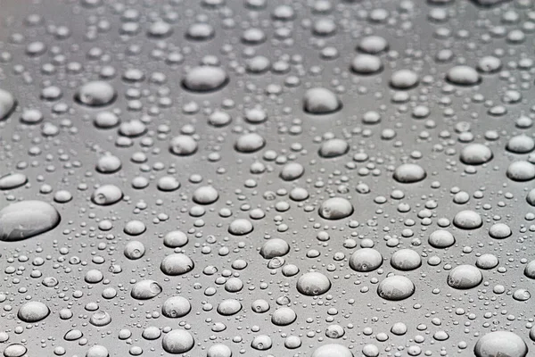 Borrosa de gota de agua en el suelo — Foto de Stock