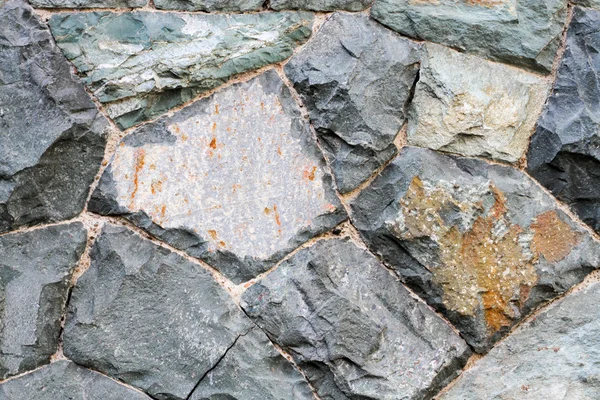 Abstrakt bakgrund av stenmurar bakgrund — Stockfoto