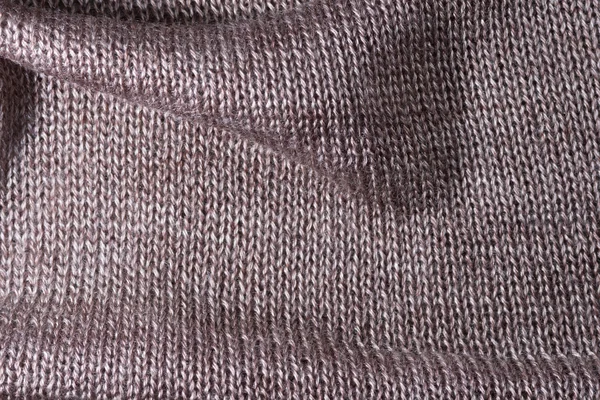 The knitted fabric — Stock Photo, Image