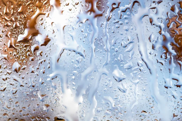 Waterdruppels op glas Rechtenvrije Stockfoto's