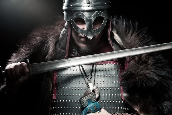 Viking warrior, male dressed in Barbarian style with sword, bear — Stock Photo, Image