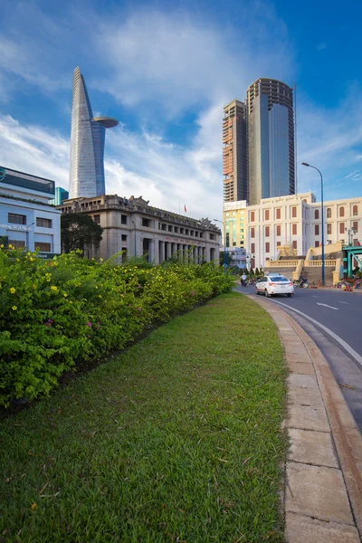 Downtown street of SaiGon at Cau Mong bridge, downtown center with buildings across riverside Saigon river Ho Chi Minh City — Stock Photo, Image