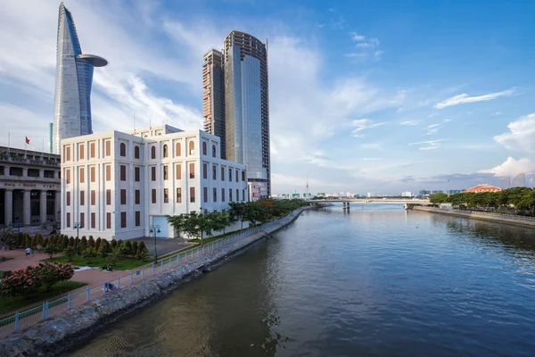 Saigon riverside view at downtown center with buildings across riverside Saigon river Ho Chi Minh City — Stock Photo, Image