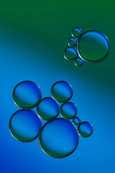 Gotas de aceite y burbujas de aire en el agua —  Fotos de Stock