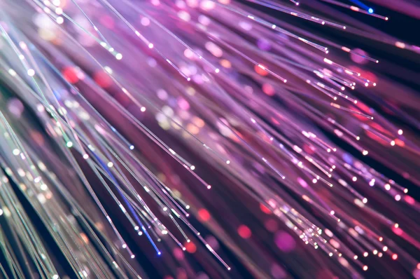 Fiber optics lights abstract background — Stock Photo, Image
