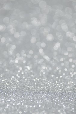 Odaklanamayan soyut gümüş ışıklar arka planı