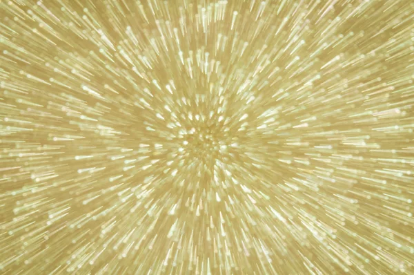 Golden glitter explosion lights abstract background — Stock Photo, Image