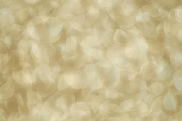 Desenfocado abstracto pálido oro luces fondo — Foto de Stock