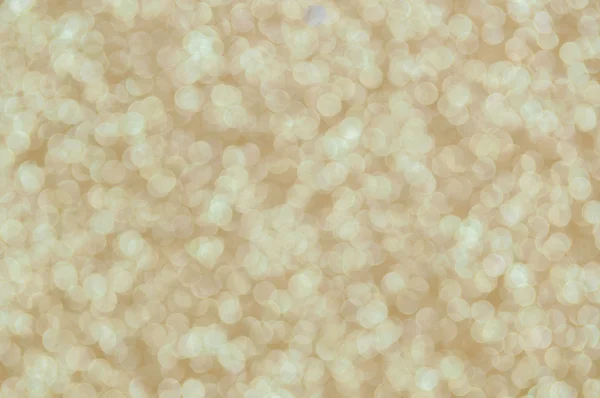 Defocused abstract pale gold lights background — Stock Photo, Image