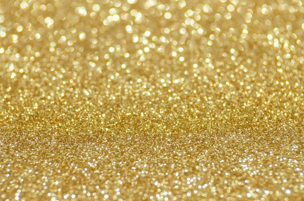 Desfocado abstrato dourado luzes fundo — Fotografia de Stock