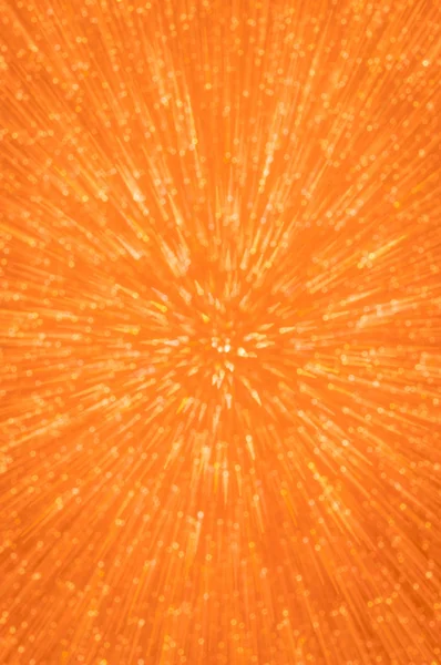 Orange glitter explosion lights abstract background — Stock Photo, Image