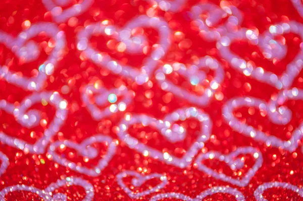 Luzes vermelhas abstratas desfocadas com fundo do coração — Fotografia de Stock