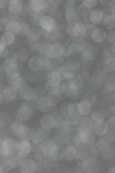 Fondo gris abstracto desenfocado luces — Foto de Stock