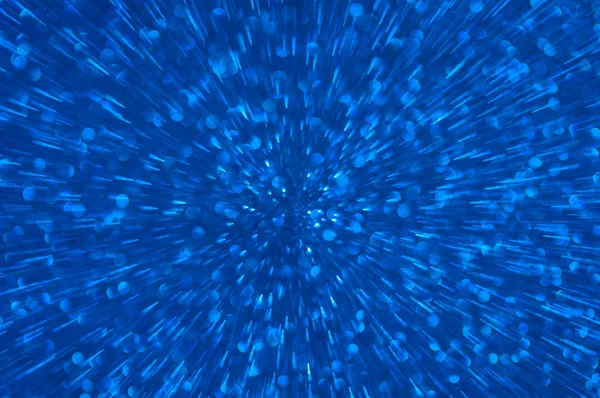 Modré třpytky explozi světla abstraktní pozadí — Stock fotografie
