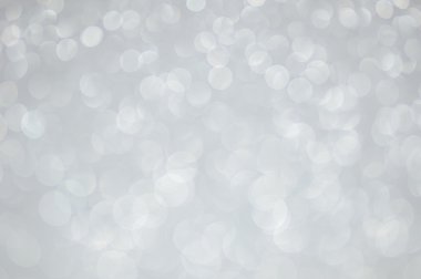 Odaklanamayan soyut gümüş ışıklar arka planı