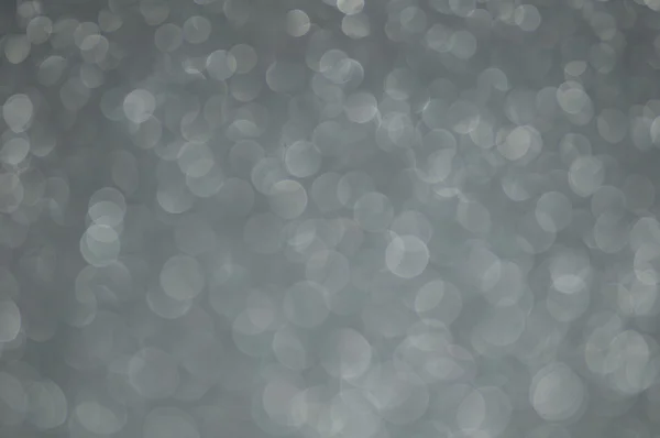 Fondo gris abstracto desenfocado luces — Foto de Stock