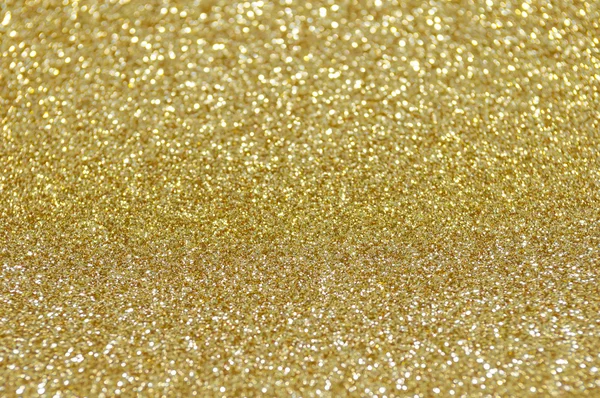 Desfocado abstrato dourado luzes fundo — Fotografia de Stock
