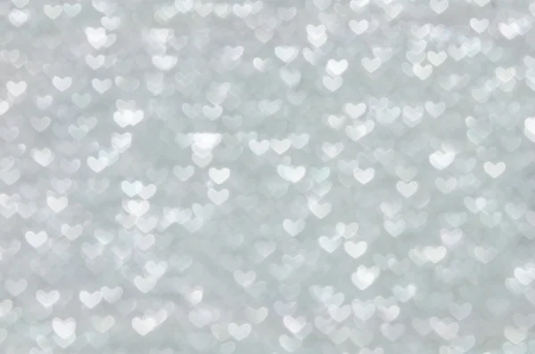 Defocused abstract silver hearts light background — Stock Photo, Image