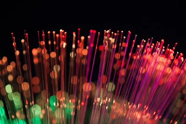 Fiber optics lights abstract background — Stock Photo, Image