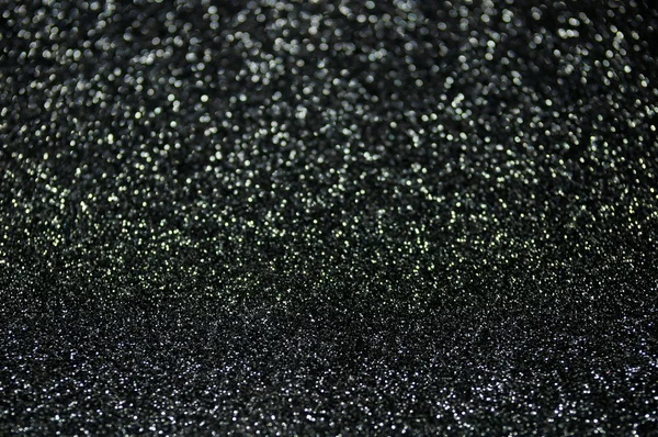 Defocused abstrakt svart ljus bakgrund — Stockfoto