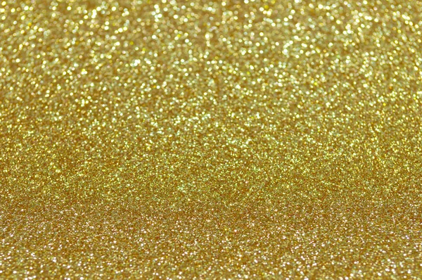 Desfocado abstrato dourado luzes fundo — Fotografia de Stock