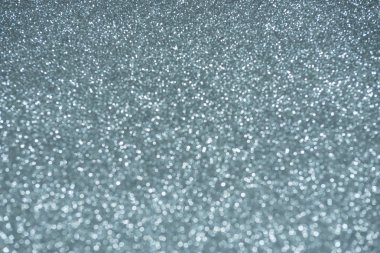 Odaklanamayan soyut gümüş ışıklar arka planı