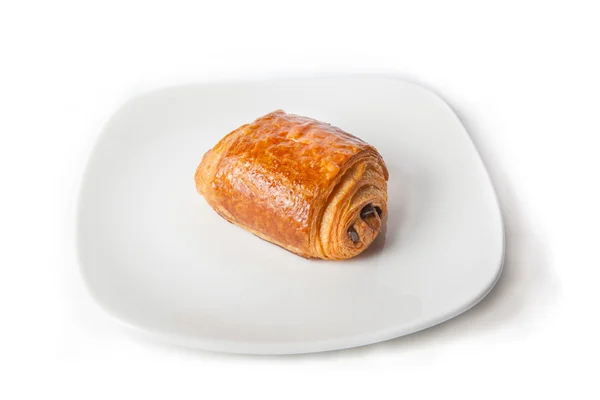 Rotolo al forno su un piatto — Foto Stock