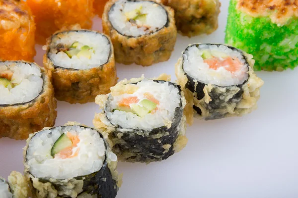 Diferentes rolos de sushi — Fotografia de Stock