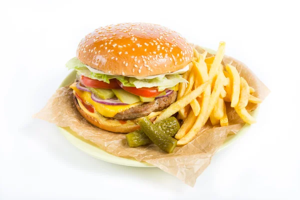 Hamburger with french fries and pickles — Stock Photo, Image