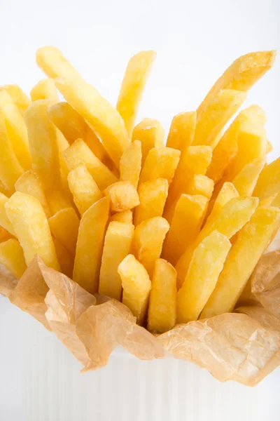 French fries in a paper wrapper — Stock Photo, Image