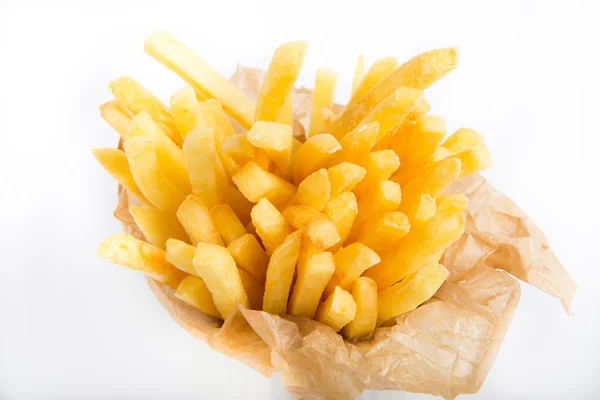 French fries in a paper wrapper — Stock Photo, Image