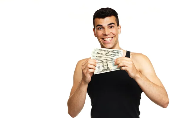 Hombre sonriente mostrando dinero —  Fotos de Stock